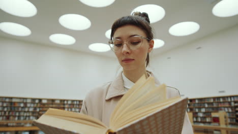Beautiful-Woman-Reading-Book-in-Library